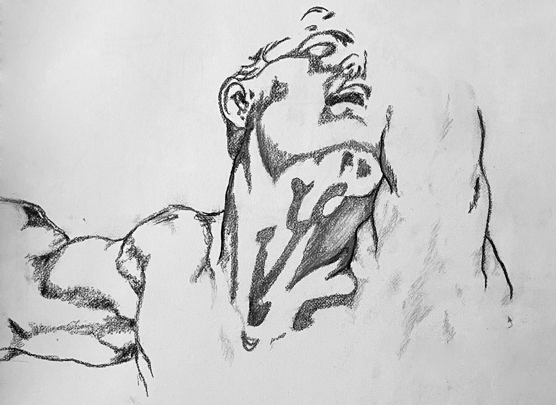 Loose graphite figure sketch of a reclining man